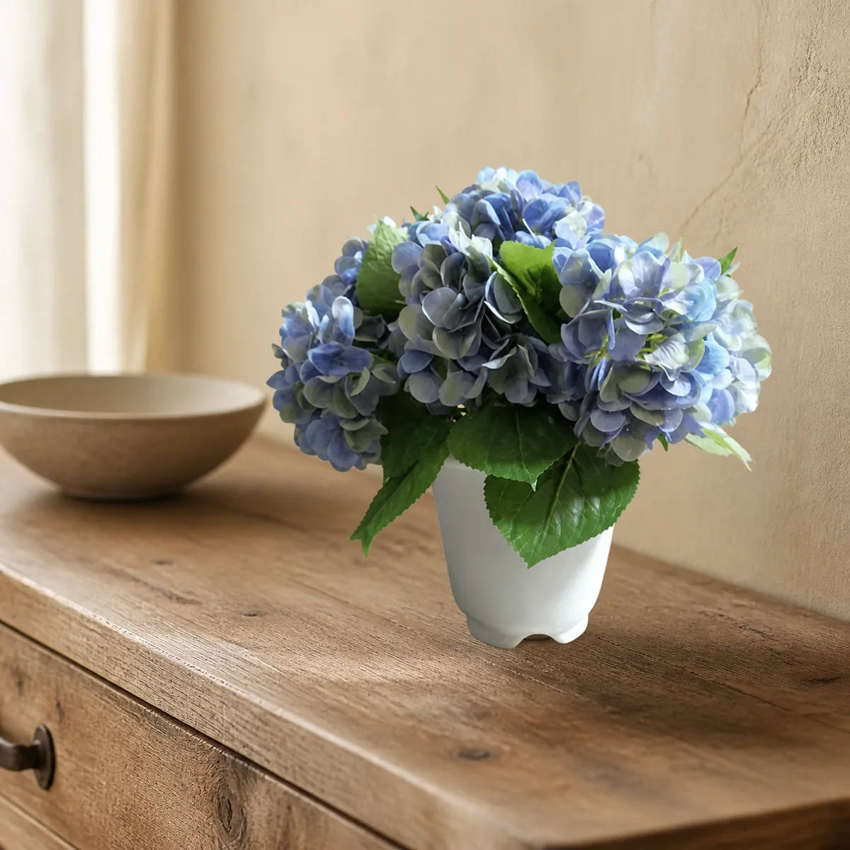 Blue Hydrangea Pot staged in a curated room setting one.